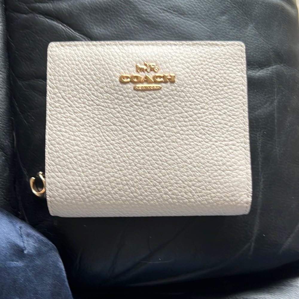 White leather Coach wallet. Never used.